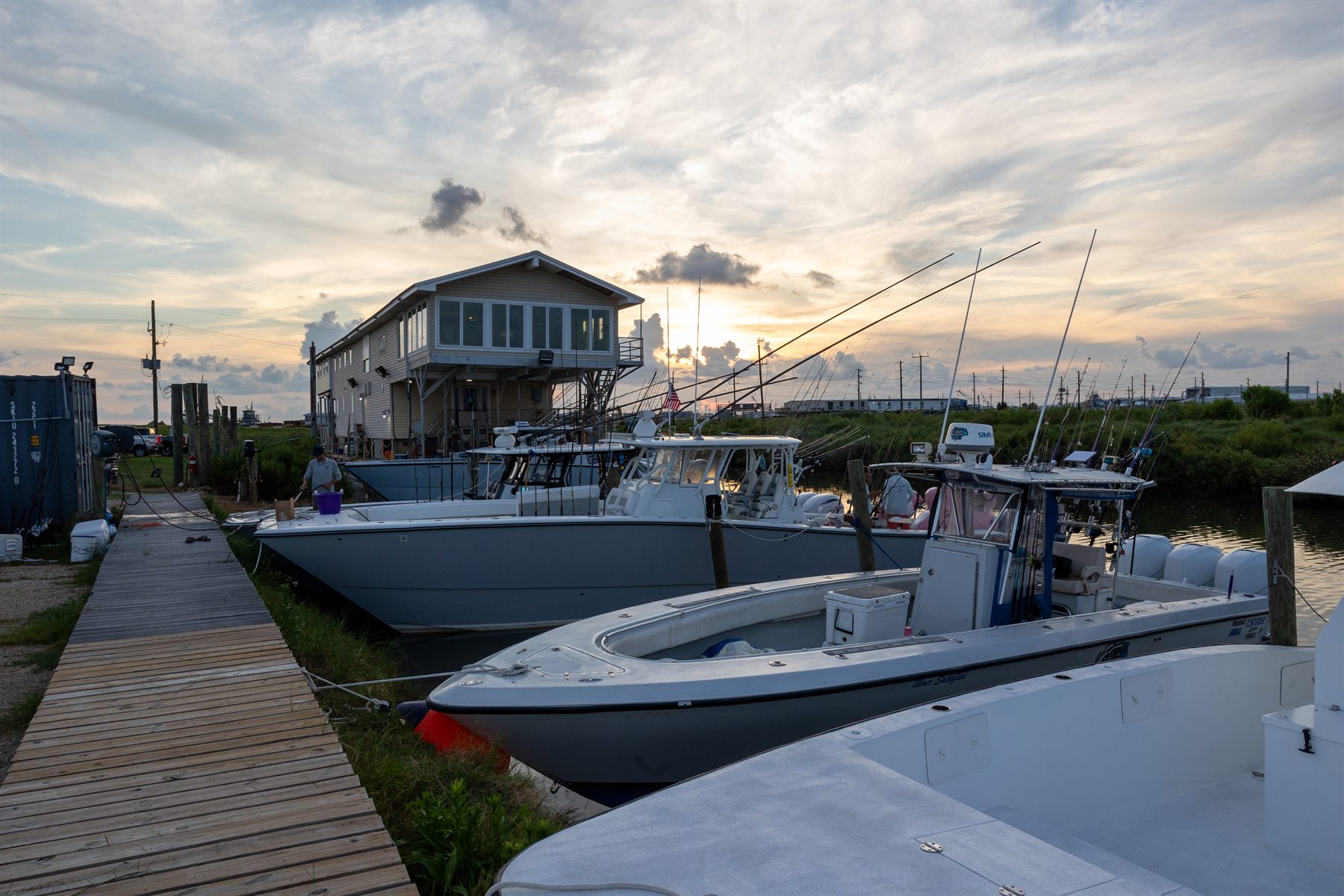 Sunset over the Down the Bayou lodge and private docks